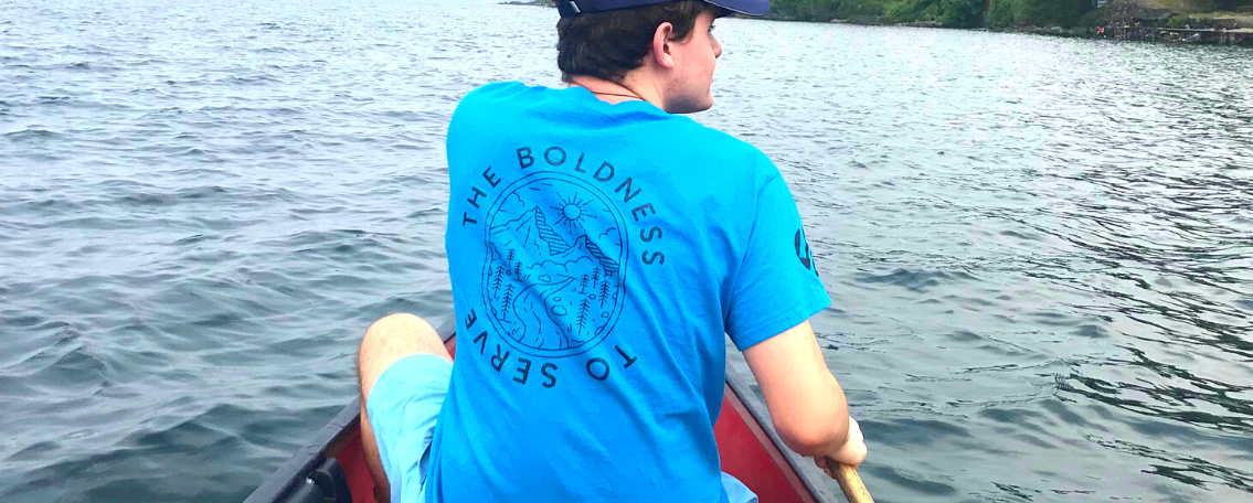 International Ministries short-term mission participant in canoe in Democratic Republic of the Congo